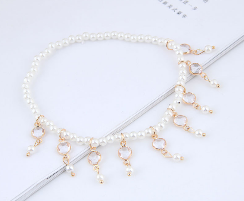 Close-up shot highlighting the delicate pearl tassels on the Pearl Tassel Anklet and Pearl Anklet.
