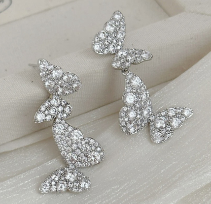 Silver Bow Pearl Stud Earrings