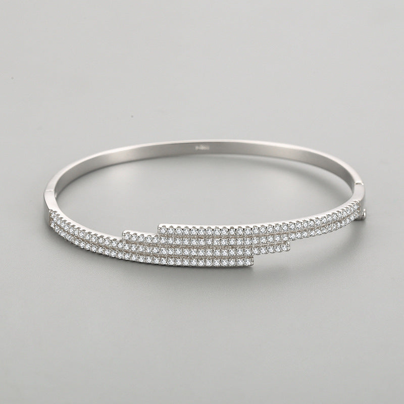 Fashion Line S925 Silver Bracelet showcasing a shimmering design with elegant, sparkling embellishments.