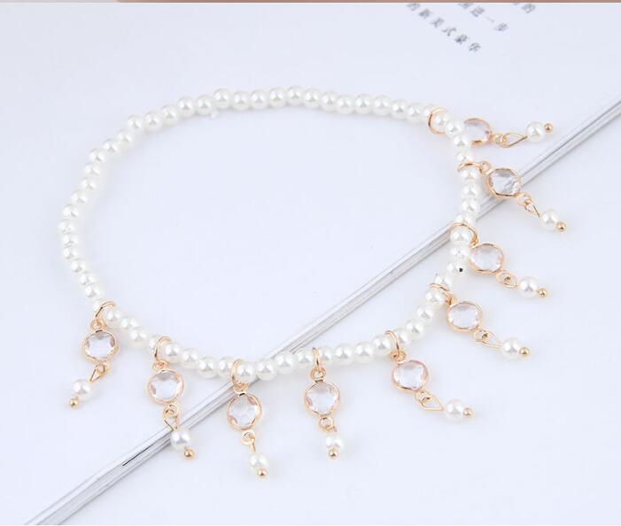 Stunning Gold Pearl Tassel Anklet and Pearl Anklet with a brilliant diamond treatment.