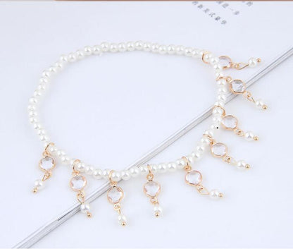 Stunning Gold Pearl Tassel Anklet and Pearl Anklet with a brilliant diamond treatment.