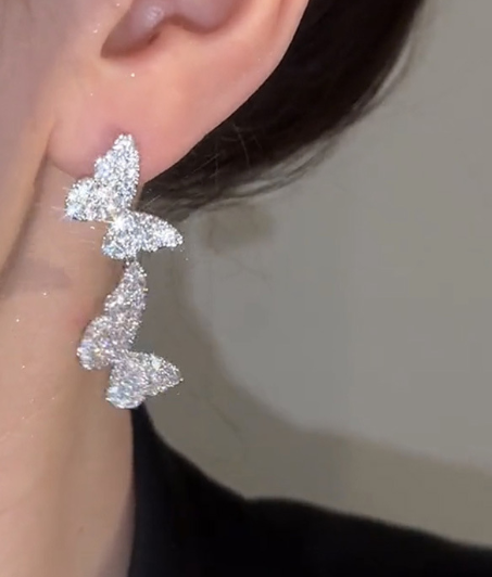 Silver Bow Pearl Stud Earrings