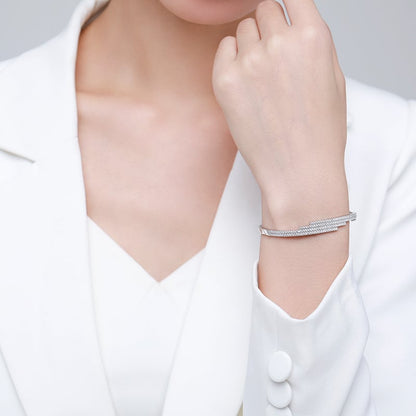 Fashion Line S925 Silver Bracelet showcased on a woman's wrist, emphasizing elegance and modern style.