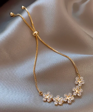 Close-up view of the Titanium Steel Zircon Flower bracelet showcasing the floral design.