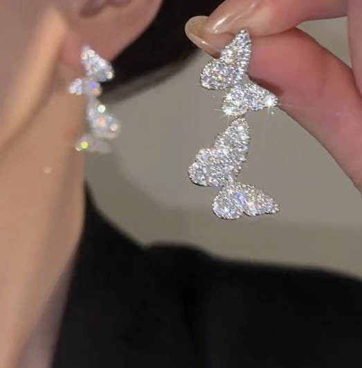 Silver Bow Pearl Stud Earrings
